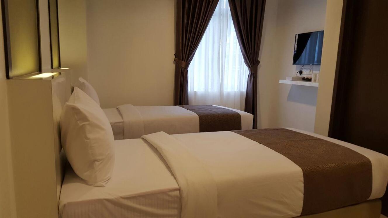 Crescendo Boutique Hotel Hock Lam Village Esterno foto